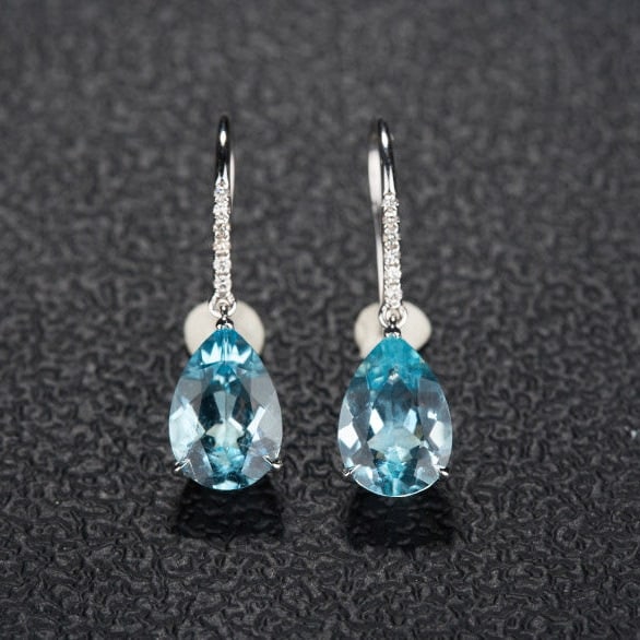 14k Gold 3.06 Ct Natural Aquamarine & Diamond Earrings: Ref:231103259 // gold content:14k gold // main gemstone:aquamarine // shape:pear // carat weight:3. 06ct // color:santa maria color // treatment:natural // // adjacent gemstone 2 : diamond //