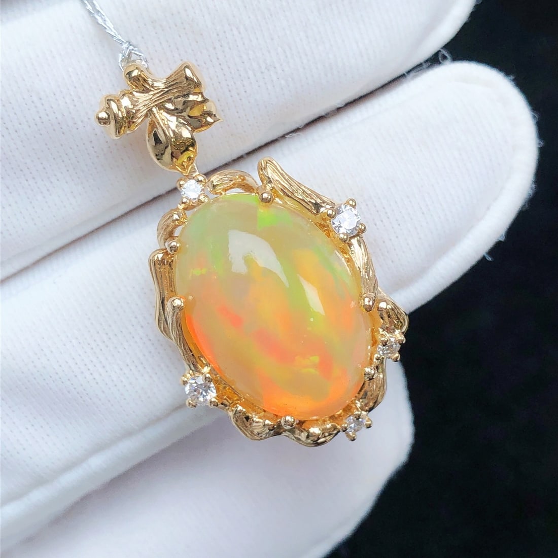 14k Gold 4.12 Ctw Natural Opal & Diamond Pendant( Without Chain ): Ref:231104028 // gold content:14k gold // main gemstone:opal // shape:oval // carat weight:4. 0ct // color:color // treatment:natural // // adjacent gemstone 2 : diamond // shape:round // carat