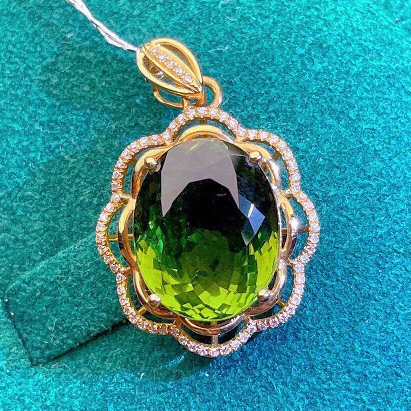 14k Gold 8.53 Ct Natural Tourmaline & Diamond Pendant( Without Chain ): Ref:231104122 // gold content:14k gold // main gemstone:tourmaline // shape:oval // carat weight:8. 53ct // color:green // treatment:natural // // adjacent gemstone 2 : diamond // shape:round //