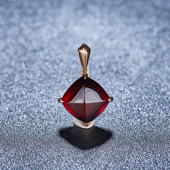 14k Gold 8.35 Ct Natural Garnet Pendant( Without Chain ): Ref:231104238 // gold content:14k gold // main gemstone:garnet // shape:sugar-loaf // carat weight:8. 35ct // color:red // treatment:natural // Condition: New Low Estimate: 1700.00 High Estimate: