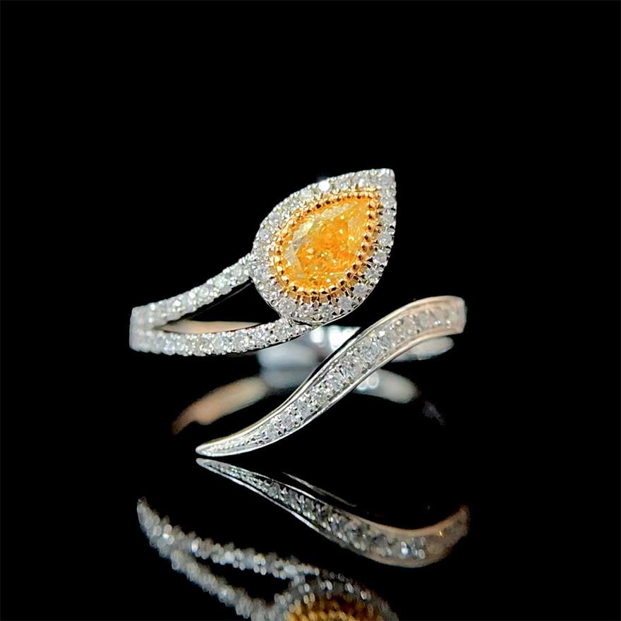 14k Gold 0.52 Ctw Natural Yellow Diamond & Diamond Ring: Ref:231104242 // gold content:14k gold // ring size:7. 25us // // main gemstone:yellow diamond // shape:pear // carat weight:0. 32ct // color:yellow // treatment:natural // // adjacent gemstone 2 : di