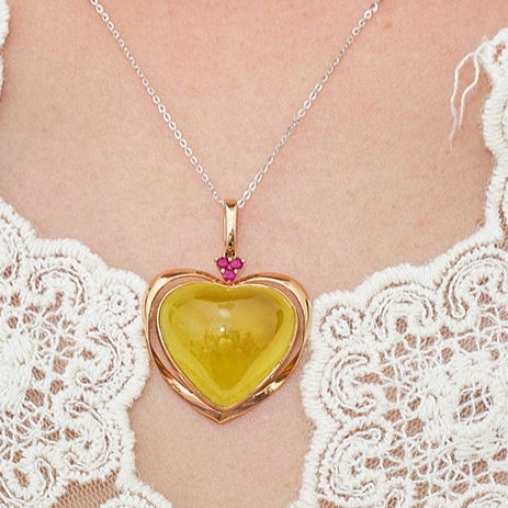 14k Gold 30.58 Ct Natural Prehnite & Ruby Pendant( Without Chain ): Ref:231104251 // gold content:14k gold // main gemstone:prehnite // shape:heart // carat weight:30. 58ct // color:yellow // treatment:natural // // adjacent gemstone 2 : ruby // shape:round // color:r