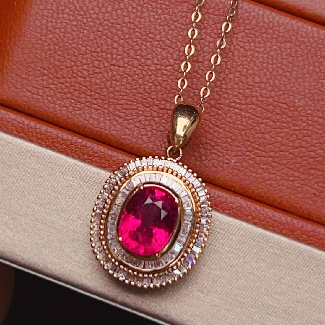 14k Gold 2.35 Ct Natural Tourmaline & Diamond Pendant( Without Chain ): Ref:231104295 // gold content:14k gold // main gemstone:tourmaline // shape:oval // carat weight:2. 35ct // color:red // treatment:natural // // adjacent gemstone 2 : diamond // number of stones:119