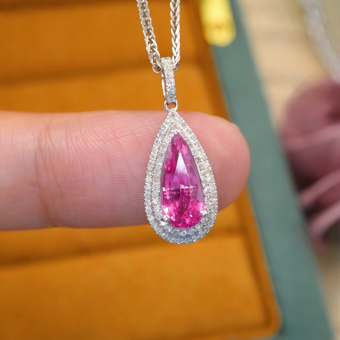 14k Gold 1.72 Ctw Natural Padparadscha Sapphire & Diamond Pendant( Without Chain ): Ref:231104425 // gold content:14k gold // main gemstone:padparadscha sapphire // shape:pear // carat weight:1. 55ct // color:orangish pink // treatment:natural // // adjacent gemstone 2 : diamond // n