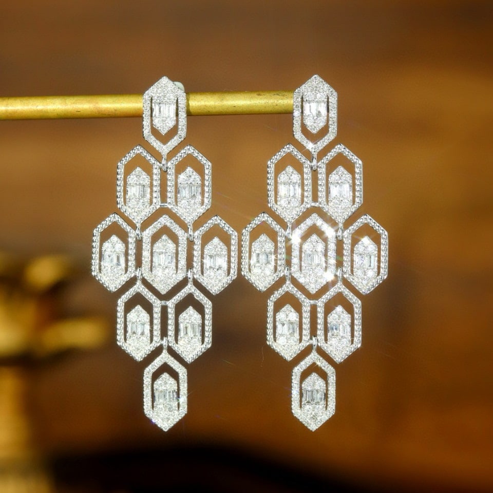 14k Gold 0.80 Ct Natural H Diamond Earrings: Ref:231105007 // gold content:14k gold // main gemstone:diamond // shape:multiple // carat weight:0. 80ct // clarity grade:vs-si // color:h // treatment:natural // Condition: New Low Estimate: