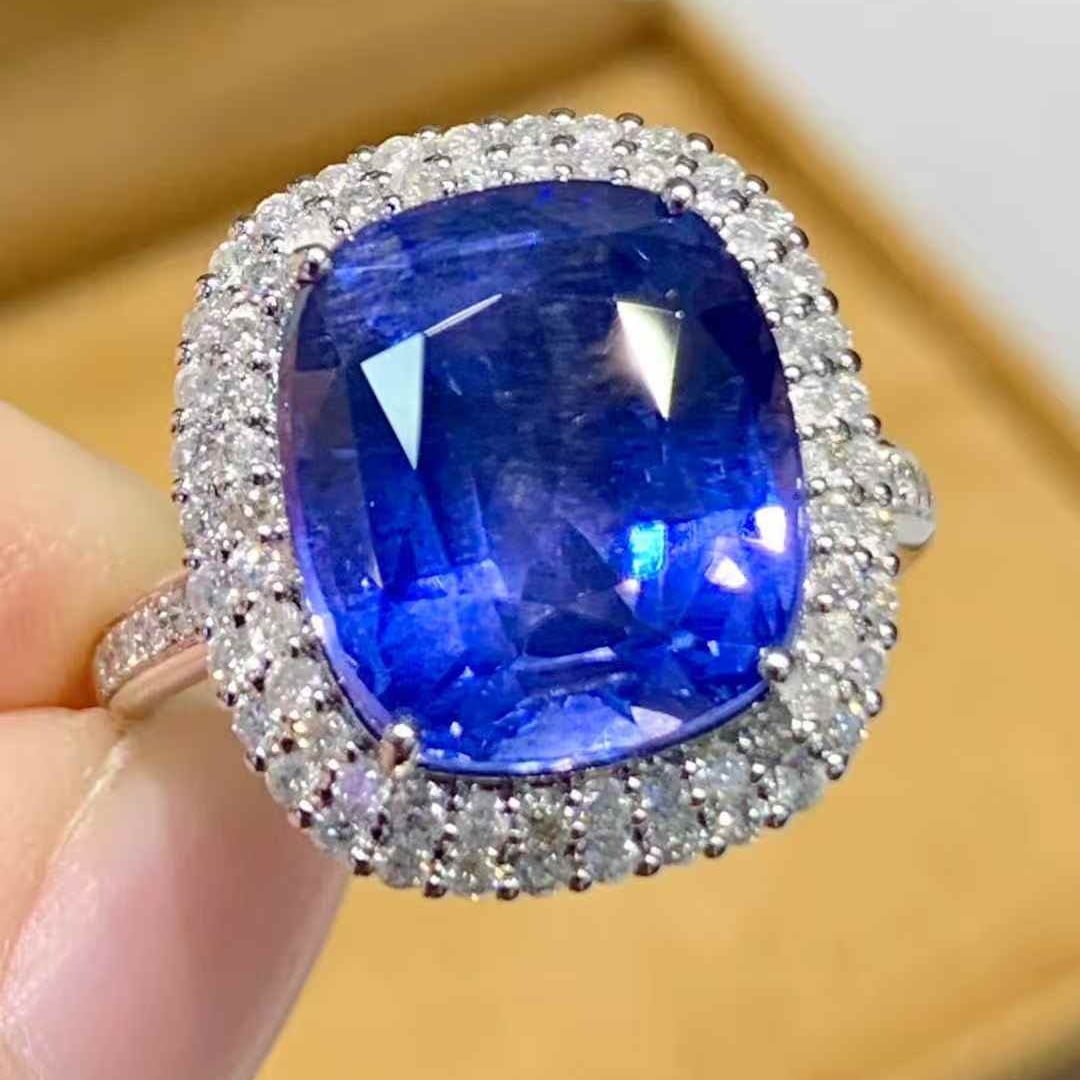 14k Gold 6.9 Ct Natural Sapphire & Diamond Ring: Ref:231105025 // gold content:14k gold // ring size:7. 25us // // main gemstone:sapphire // shape:cushion // carat weight:6. 9ct // color:cornflower blue // treatment:natural // // adjacent gemstone 2