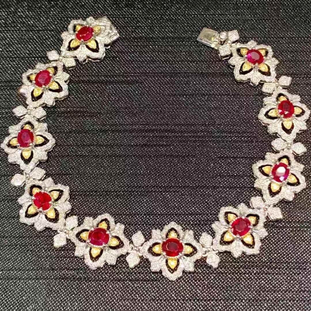 14k Gold 7.2 Ct Natural Ruby & Diamond Bracelet: Ref:231105026 // gold content:14k gold // main gemstone:ruby // shape:oval // carat weight:7. 2ct // color:pigeonblood red // treatment:natural // // adjacent gemstone 2 : diamond // shape:round //