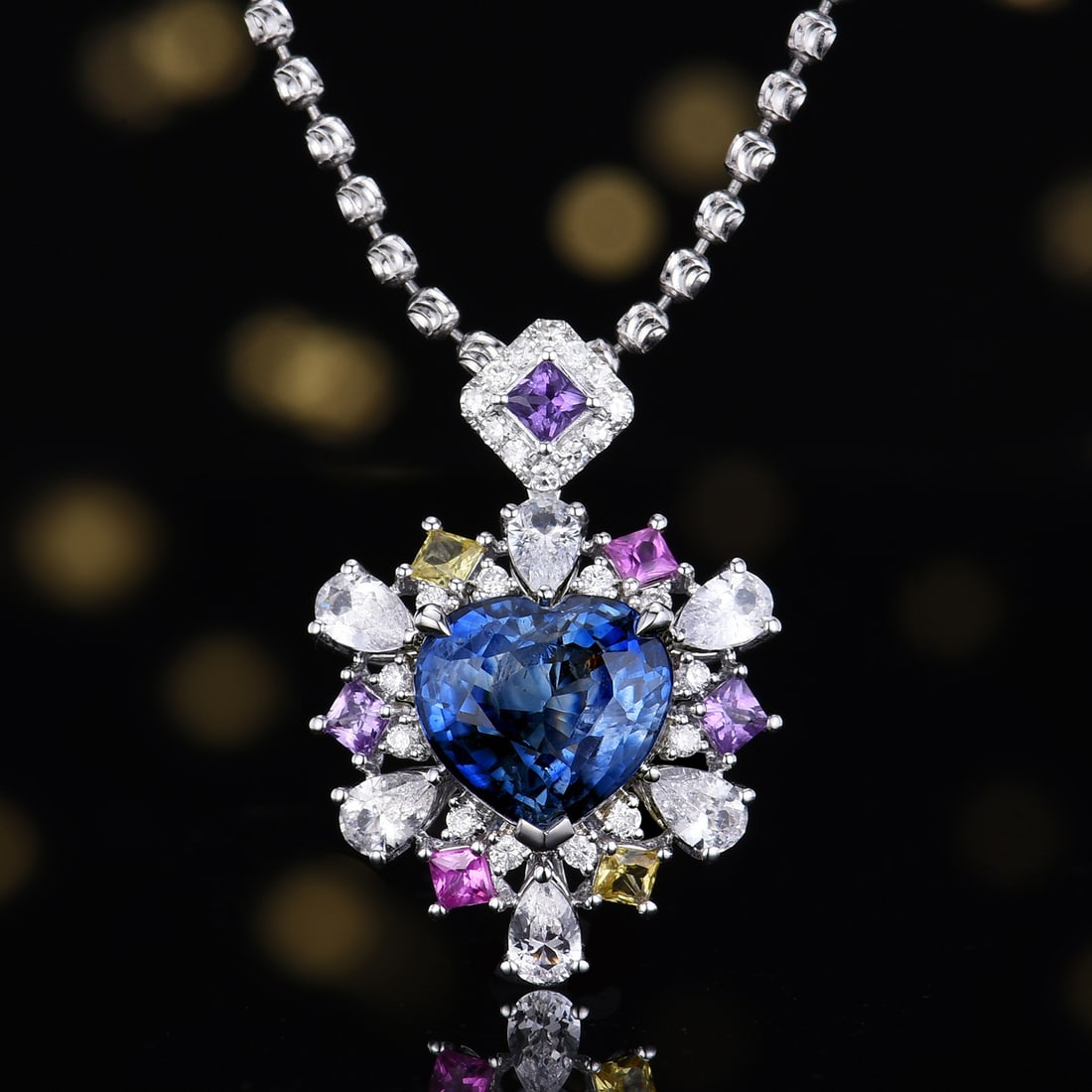 14k Gold 3.46 Ctw Natural Sapphire & Diamond Pendant( Without Chain ): Ref:231105114 // gold content:14k gold // main gemstone:sapphire // shape:heart // carat weight:3. 32ct // color:blue // treatment:natural // // adjacent gemstone 2 : diamond // number of stones:24 //