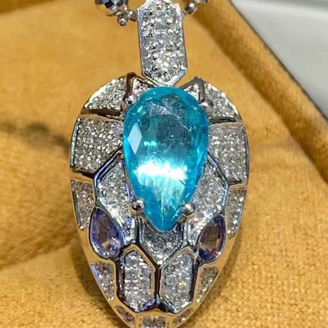 14k Gold 1.00 Ct Natural Paraiba Tourmaline & Diamond Pendant( Without Chain ): Ref:231105139 // gold content:14k gold // main gemstone:paraiba tourmaline // shape:pear // carat weight:1. 00ct // color:blue // treatment:natural // // adjacent gemstone 2 : diamond // shape:round