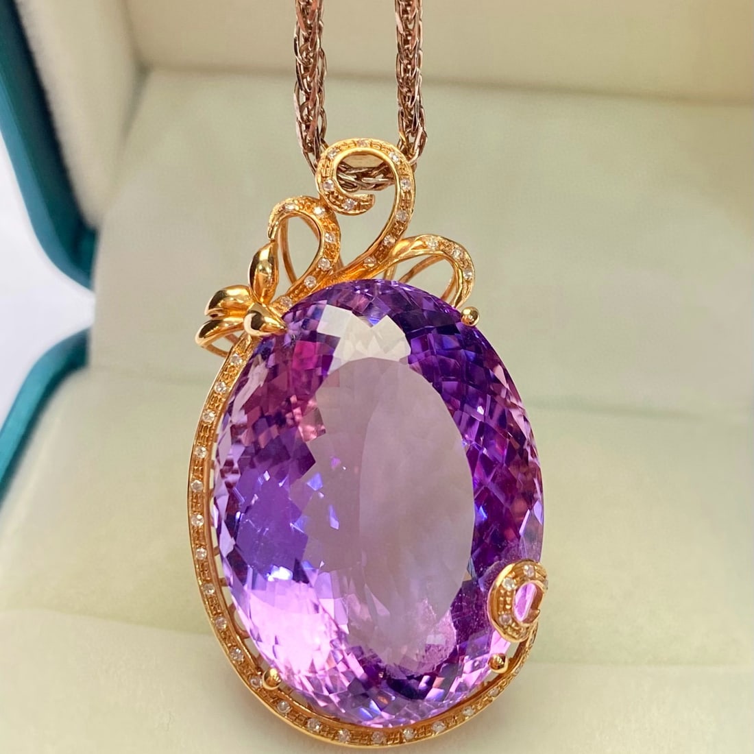 14k Gold 41.75 Ct Natural Amethyst & Diamond Pendant( Without Chain ): Ref:231105143 // gold content:14k gold // main gemstone:amethyst // shape:oval // carat weight:41. 75ct // color:purple // treatment:natural // // adjacent gemstone 2 : diamond // number of stones:45