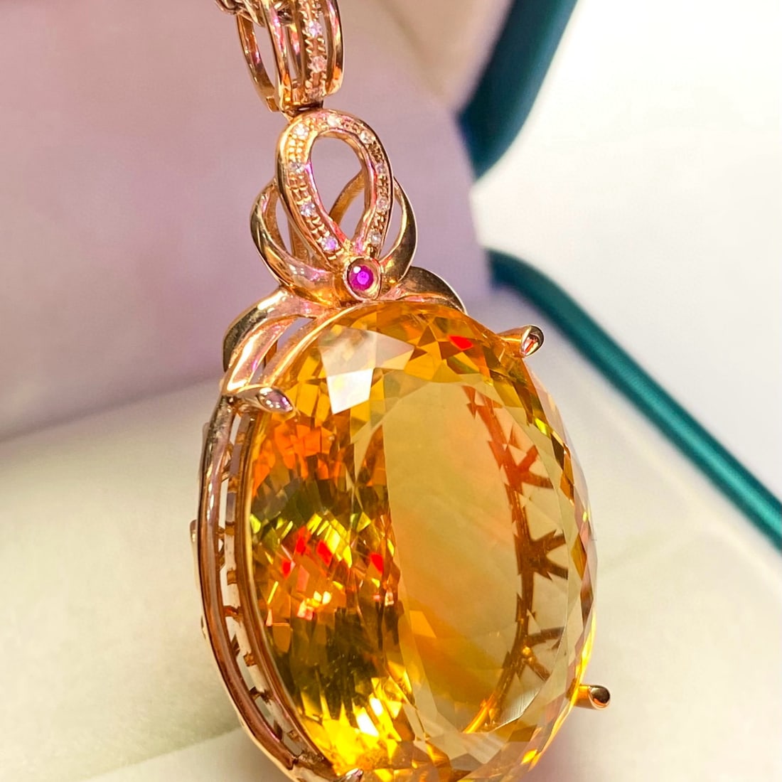 14k Gold 31.45 Ct Natural Citrine & Diamond Pendant( Without Chain ): Ref:231105145 // gold content:14k gold // main gemstone:citrine // shape:oval // carat weight:31. 45ct // color:yellow // treatment:natural // // adjacent gemstone 2 : diamond // number of stones:24 /