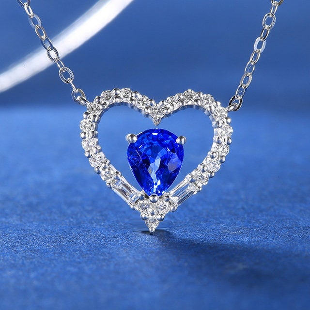 14k Gold 1.05 Ctw Natural Sapphire & Diamond Necklace: Ref:231105153 // gold content:14k gold // main gemstone:sapphire // shape:pear // carat weight:0. 82ct // color:blue // treatment:natural // // adjacent gemstone 2 : diamond // number of stones:22 // 