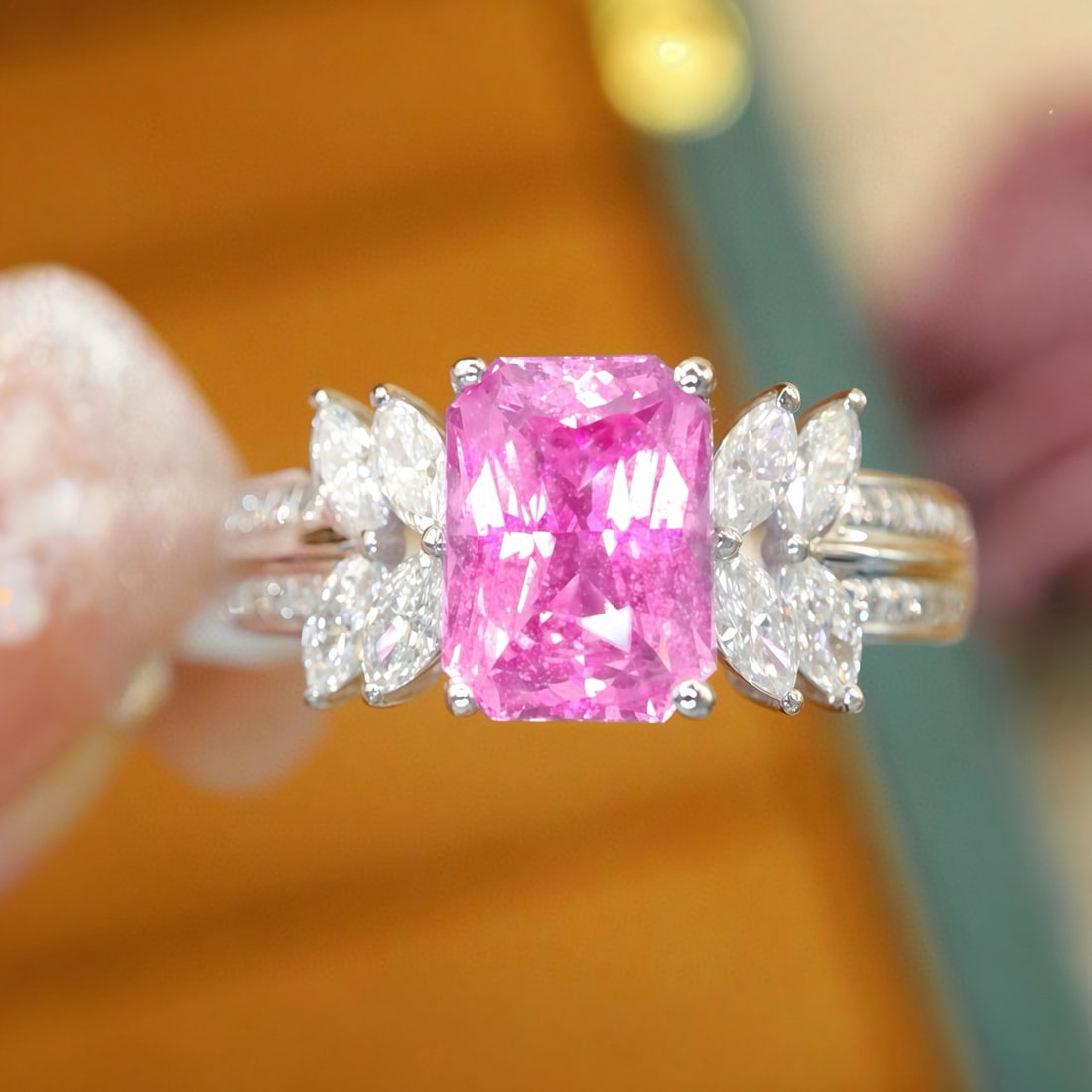 14k Gold 2.53 Ctw Natural Padparadscha Sapphire & Diamond Ring: Ref:231105156 // gold content:14k gold // ring size:7. 25us // // main gemstone:padparadscha sapphire // shape:radiant // carat weight:2. 10ct // color:pink // treatment:natural // // adjacent
