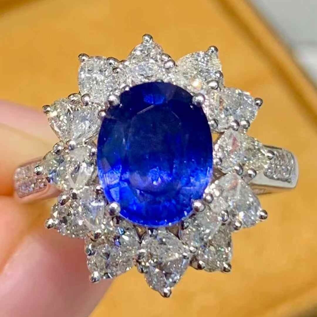 14k Gold 2.5 Ct Natural Sapphire & Diamond Ring: Ref:231105194 // gold content:14k gold // ring size:7. 25us // // main gemstone:sapphire // shape:oval // carat weight:2. 5ct // color:blue // treatment:natural // // adjacent gemstone 2 : diamond // 