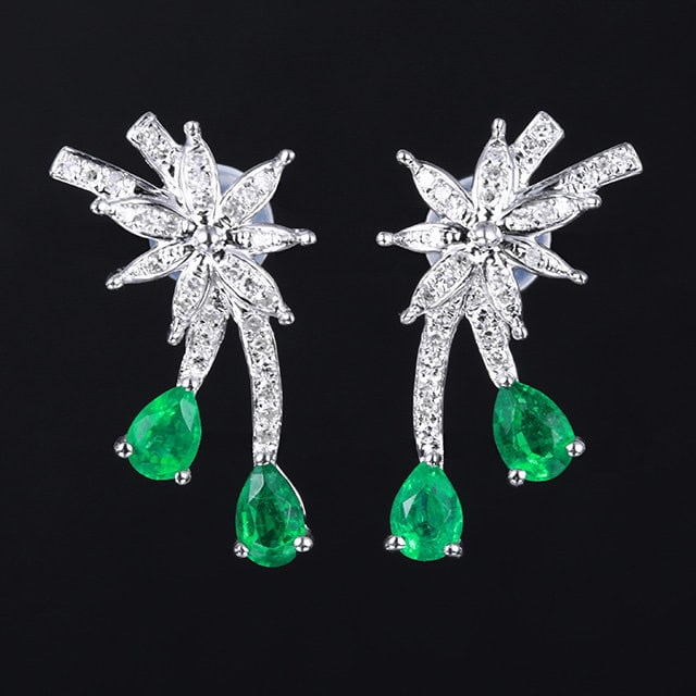 14k Gold 0.94 Ctw Natural Emerald & Diamond Earrings: Ref:231105199 // gold content:14k gold // main gemstone:emerald // shape:pear // carat weight:0. 76ct // color:green // treatment:natural // // adjacent gemstone 2 : diamond // number of stones:60 //