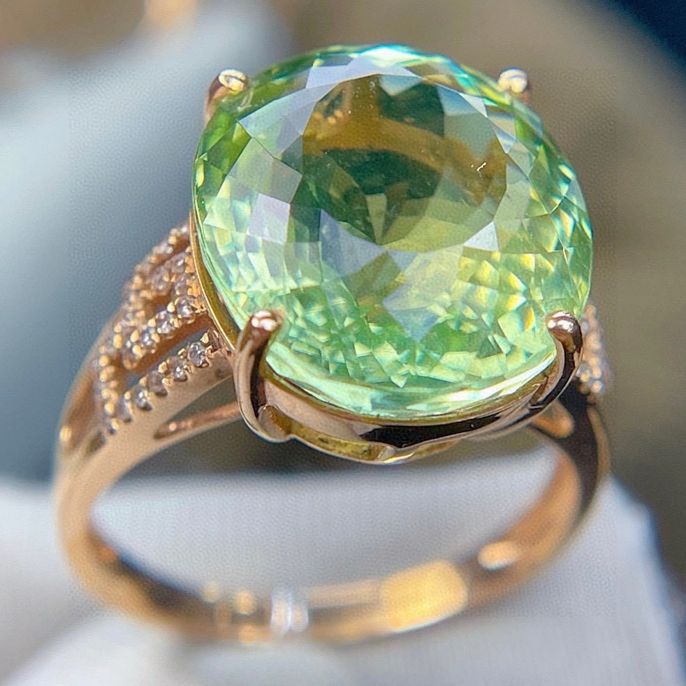 14k Gold 10.18 Ct Natural Tourmaline & Diamond Ring: Ref:231105210 // gold content:14k gold // ring size:7. 25us // // main gemstone:tourmaline // shape:oval // carat weight:10. 18ct // color:green // treatment:natural // // adjacent gemstone 2 :