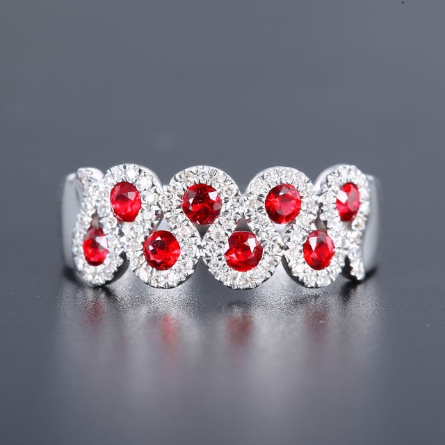 14k Gold 0.78 Ctw Natural Ruby & Diamond Ring: Ref:231105246 // gold content:14k gold // ring size:7. 25us // // main gemstone:ruby // shape:round // carat weight:0. 55ct // color:red // treatment:natural // cut grade:g // // adjacent gemstone 2