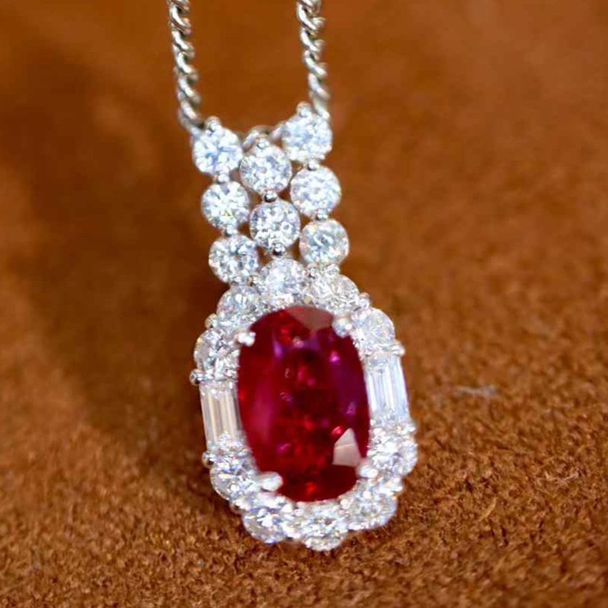 14k Gold 1.20 Ctw Natural Ruby & Diamond Pendant( Without Chain ): Ref:231106055 // gold content:14k gold // main gemstone:ruby // shape:oval // carat weight:0. 77ct // color:red // treatment:natural // // adjacent gemstone 2 : diamond // shape:multiple // carat weig