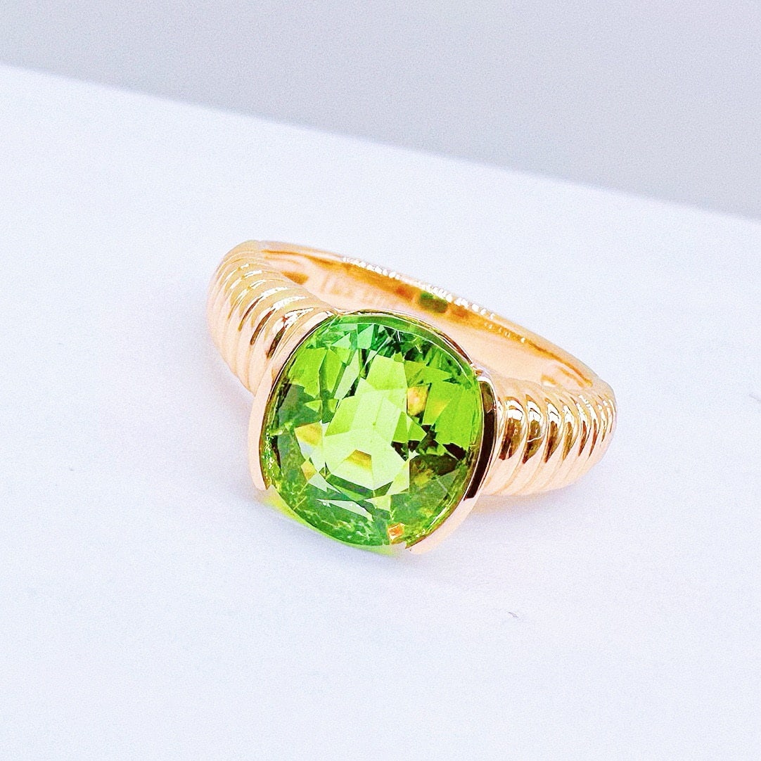 14k Gold 3.77 Ct Natural Tourmaline Ring: Ref:231106084 // gold content:14k gold // ring size:7. 25us // // main gemstone:tourmaline // shape:oval // carat weight:3. 77ct // color:green // treatment:natural // Condition: New Low Estimate:
