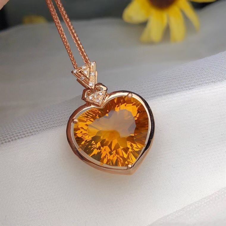 14k Gold 9.50 Ct Natural Citrine & Diamond Pendant( Without Chain ): Ref:231106091 // gold content:14k gold // main gemstone:citrine // shape:heart // carat weight:9. 50ct // color:yellow // treatment:natural // // adjacent gemstone 2 : diamond // number of stones:11 /