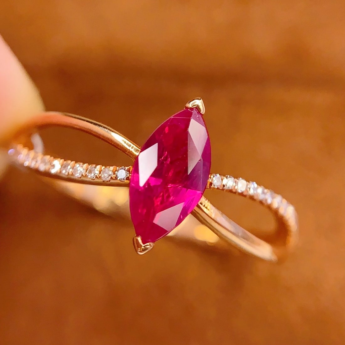 14k Gold 0.7 Ct Natural Ruby & Diamond Ring: Ref:231106118 // gold content:14k gold // ring size:7. 25us // // main gemstone:ruby // shape:marquise // carat weight:0. 7ct // color:red // treatment:natural // // adjacent gemstone 2 : diamond //