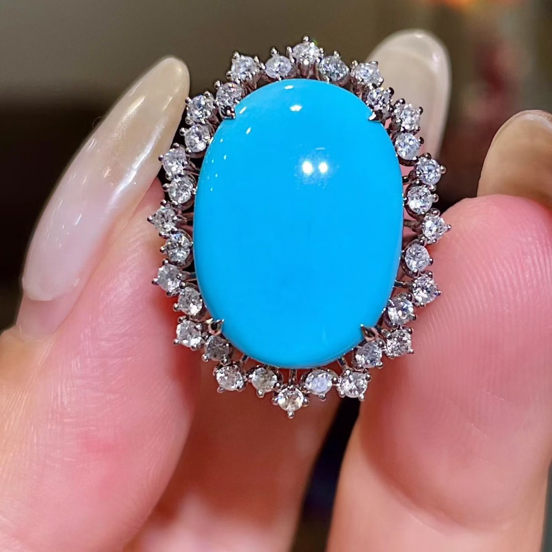 14k Gold 7.64 Ctw Natural Blue Turquoise & Diamond Ring: Ref:231106135 // gold content:14k gold // ring size:7. 25us // // main gemstone:blue turquoise // shape:oval // carat weight:6. 98ct // color:blue // treatment:natural // // adjacent gemstone 2 :