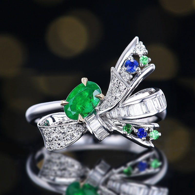 14k Gold 0.6 Ctw Vivid Green Natural Emerald & Diamond Ring: Ref:231106245 // gold content:14k gold // ring size:7. 25us // // main gemstone:emerald // shape:oval // carat weight:0. 4ct // color:vivid green // treatment:natural // // adjacent gemstone 2 : diamo