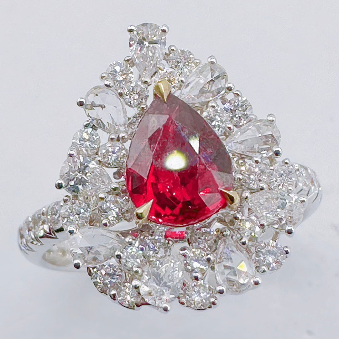 14k Gold 2.08 Ctw Natural Ruby & Diamond Ring: Ref:231106259 // gold content:14k gold // ring size:7. 25us // // main gemstone:ruby // shape:pear // carat weight:1. 17ct // color:pigeonblood red // treatment:natural // // adjacent gemstone 2 : dia