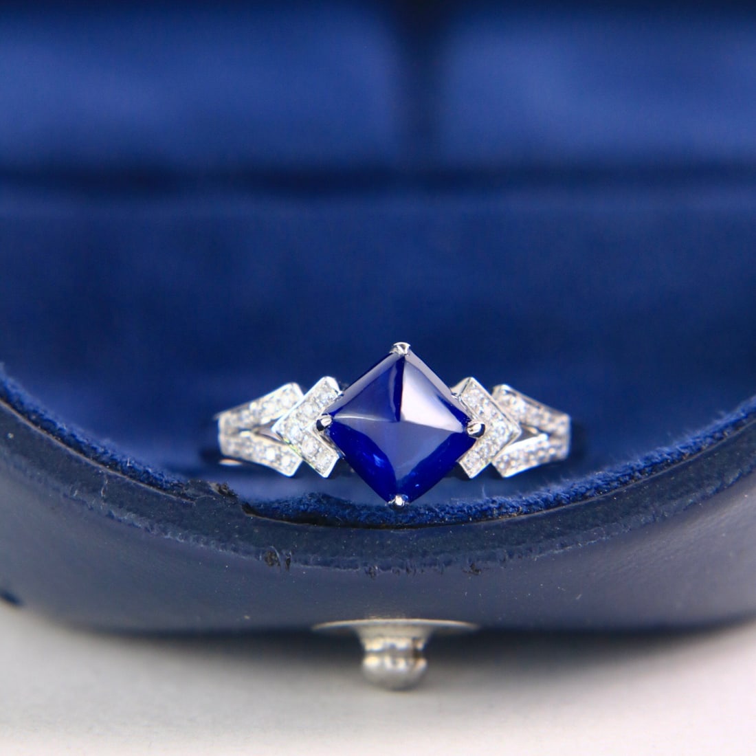 14k Gold 2.25 Ctw Natural Sapphire & Diamond Ring: Ref:231106294 // gold content:14k gold // ring size:7. 25us // // main gemstone:sapphire // shape:sugar-loaf // carat weight:2. 15ct // color:royal blue // treatment:natural // // adjacent gemstone 2