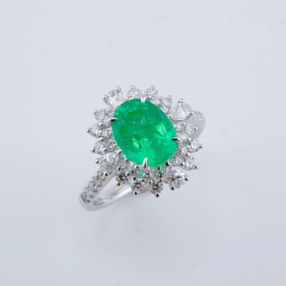 14k Gold 2.10 Ctw Natural Emerald & Diamond Ring: Ref:231106303 // gold content:14k gold // ring size:7. 25us // // main gemstone:emerald // shape:oval // carat weight:1. 44ct // color:green // treatment:natural // // adjacent gemstone 2 : diamond //