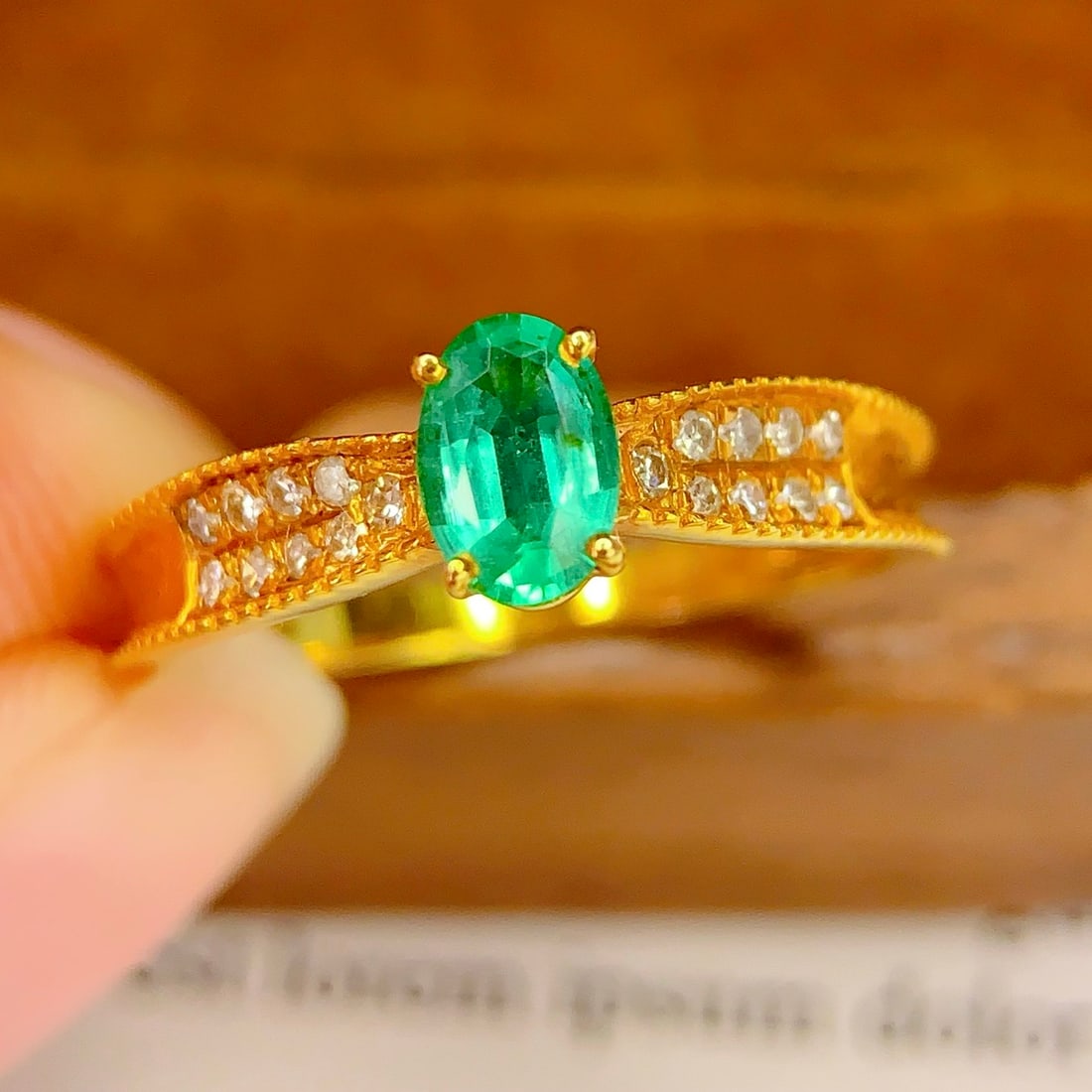14k Gold 0.6 Ct Natural Emerald & Diamond Ring: Ref:231106339 // gold content:14k gold // ring size:7. 25us // // main gemstone:emerald // shape:oval // carat weight:0. 6ct // color:green // treatment:natural // // adjacent gemstone 2 : diamond //