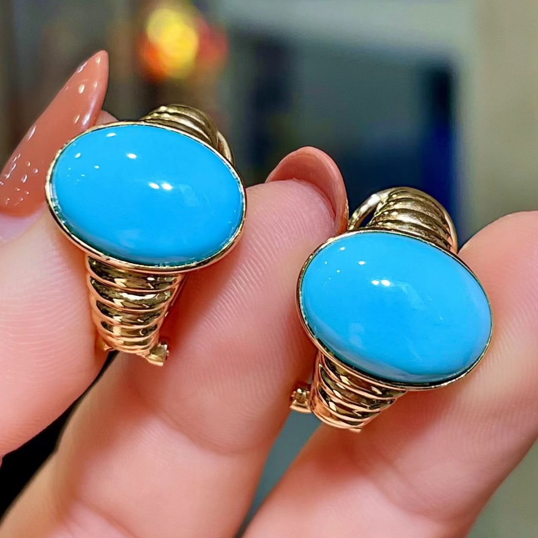 14k Gold 10.42 Ct Natural Blue Turquoise Earrings: Ref:231106362 // gold content:14k gold // main gemstone:blue turquoise // shape:oval // carat weight:10. 42ct // color:blue // treatment:natural // Condition: New Low Estimate: 8100.00 High Estimate: