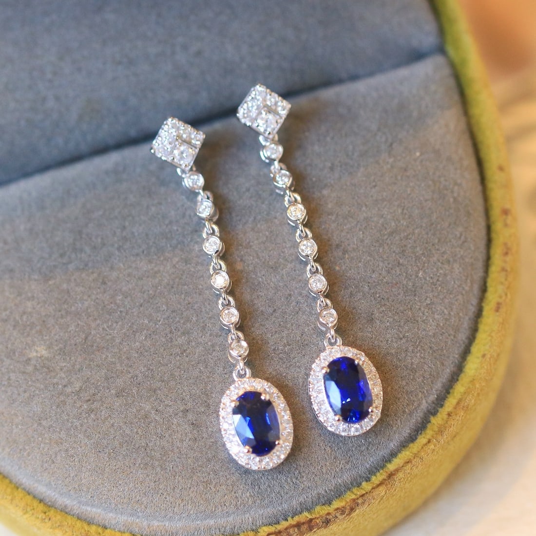 14k Gold 1.44 Ctw Natural Sapphire & Diamond Earrings: Ref:231106378 // gold content:14k gold // main gemstone:sapphire // shape:oval // carat weight:1. 16ct // color:blue // treatment:natural // // adjacent gemstone 2 : diamond // shape:round // carat