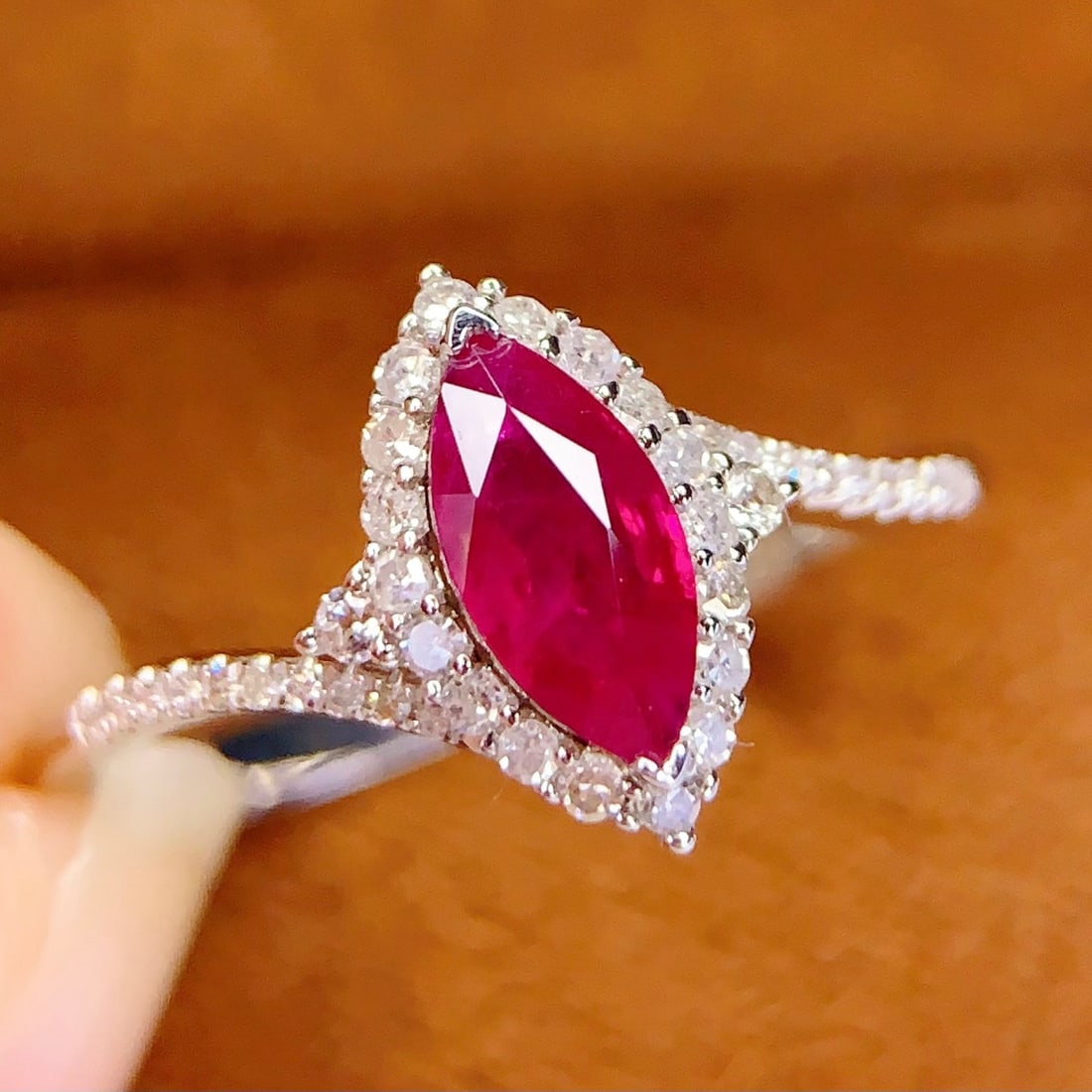 14k Gold 0.7 Ct Natural Ruby & Diamond Ring: Ref:231106389 // gold content:14k gold // ring size:7. 25us // // main gemstone:ruby // shape:marquise // carat weight:0. 7ct // color:red // treatment:natural // // adjacent gemstone 2 : diamond //