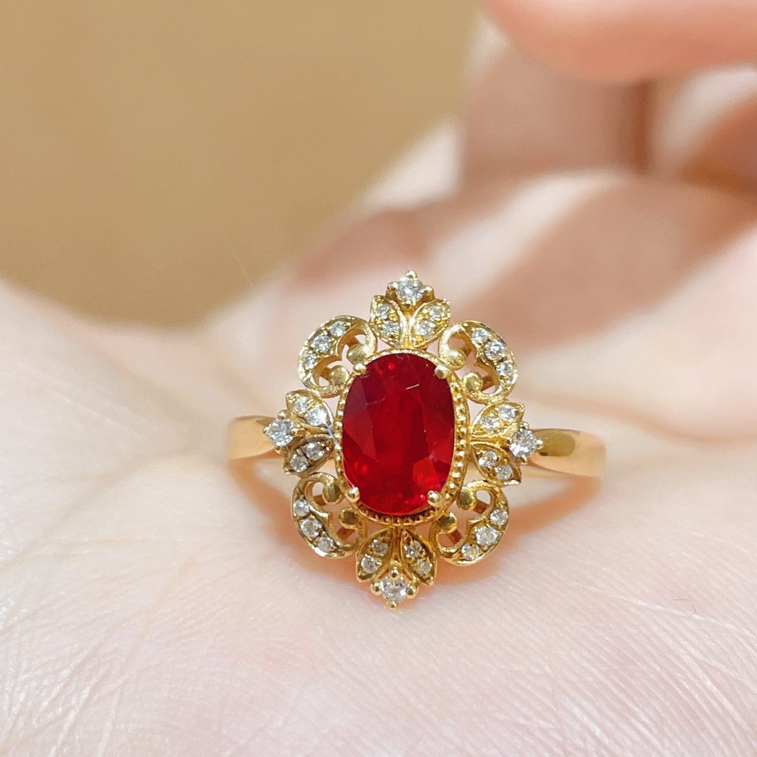 14k Gold 1.14 Ctw Natural Ruby & Diamond Ring: Ref:231106420 // gold content:14k gold // ring size:7. 25us // // main gemstone:ruby // shape:oval // carat weight:1. 00ct // color:pigeonblood red // treatment:natural // // adjacent gemstone 2 :