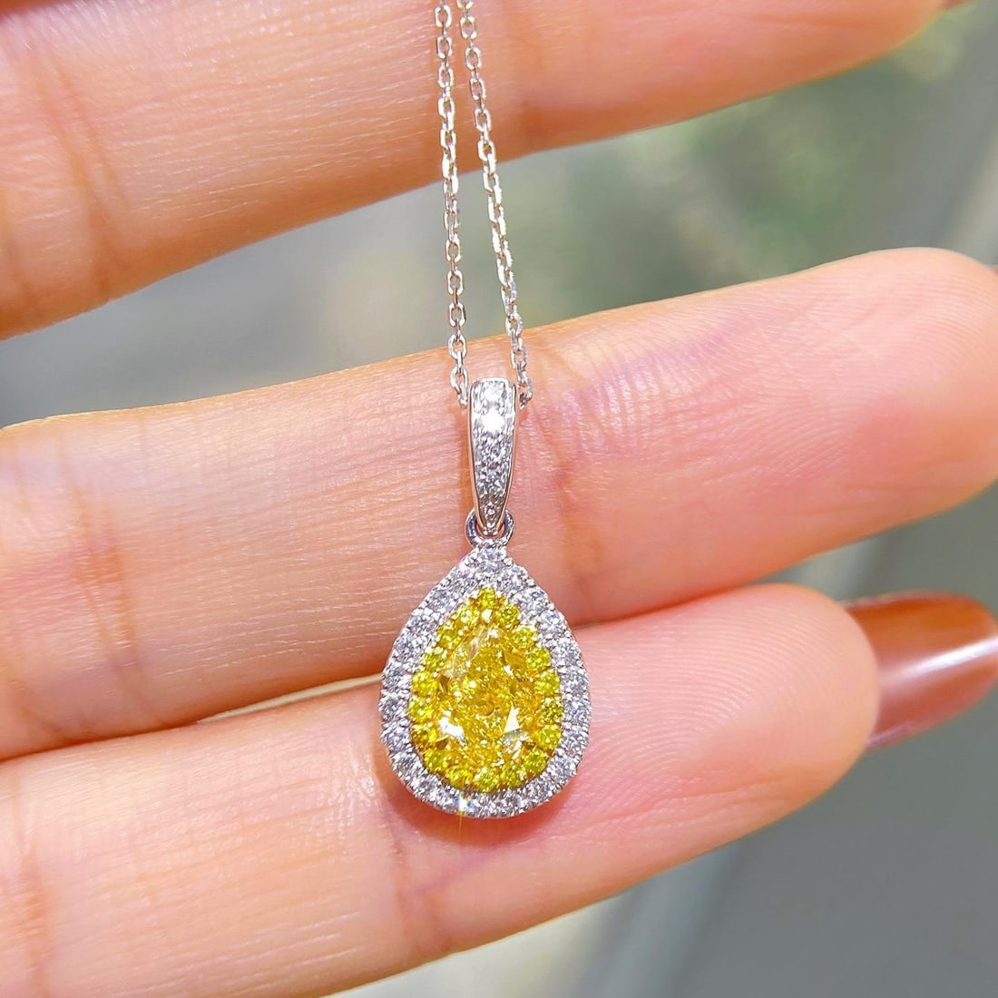 Gia Certified 14k Gold 0.91 Ctw Natural Yellow Diamond & Diamond Necklace: Ref:231106449 // gold content:14k gold // main gemstone:yellow diamond // certified:gia // shape:pear // carat weight:0. 64ct // clarity grade:vs1 // color:yellow // treatment:natural // saturability:
