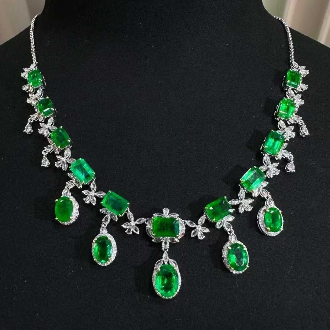 14k Gold 13.25 Ct Vivid Green Natural Emerald & Diamond & Sapphire Necklace: Ref:231107026 // gold content:14k gold // main gemstone:emerald // shape:multiple // carat weight:13. 25ct // color:vivid green // treatment:natural // // adjacent gemstone 2 : diamond // shape:round