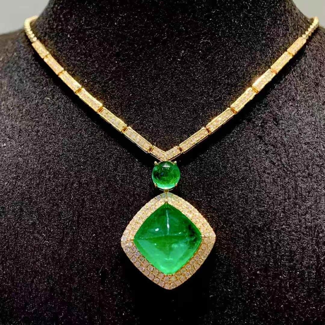 14k Gold 6.8 Ct Natural Emerald & Diamond Necklace: Ref:231107061 // gold content:14k gold // main gemstone:emerald // shape:sugar-loaf // carat weight:6. 8ct // color:green // treatment:natural // // adjacent gemstone 2 : diamond // shape:round //