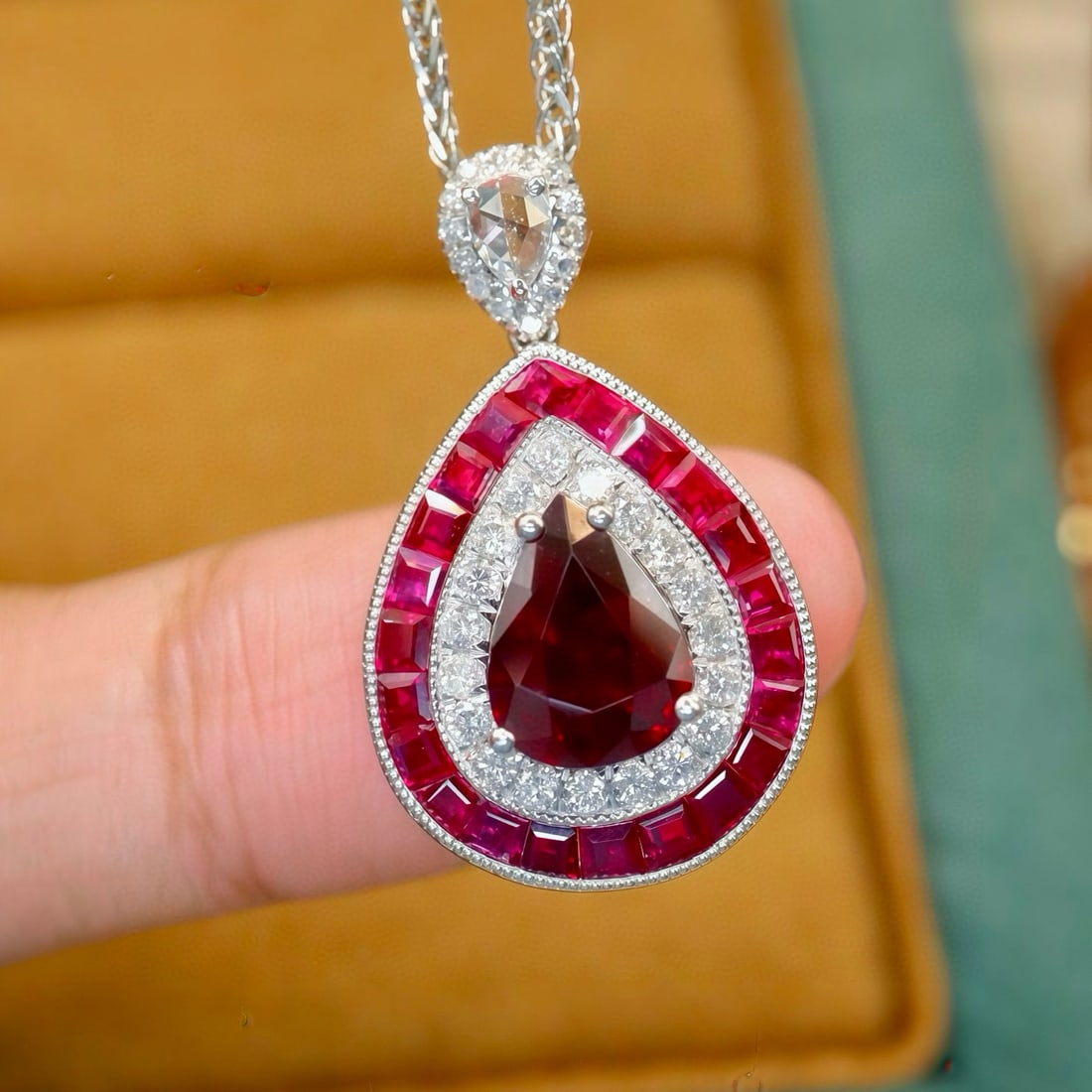 14k Gold 2.55 Ctw Natural Ruby & Ruby Pendant( Without Chain ): Ref:231107113 // gold content:14k gold // main gemstone:ruby // shape:pear // carat weight:1. 3ct // color:pigeonblood red // treatment:natural // // adjacent gemstone 2 : ruby // shape:square // cara