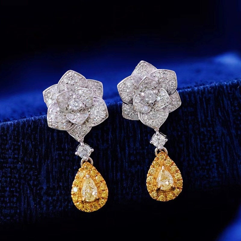 14k Gold 0.9 Ct Natural Color Diamond Earrings: Ref:231107120 // gold content:14k gold // main gemstone:diamond // shape:multiple // carat weight:0. 9ct // clarity grade:vs-si // color:color // treatment:natural // Condition: New Low Estimate: