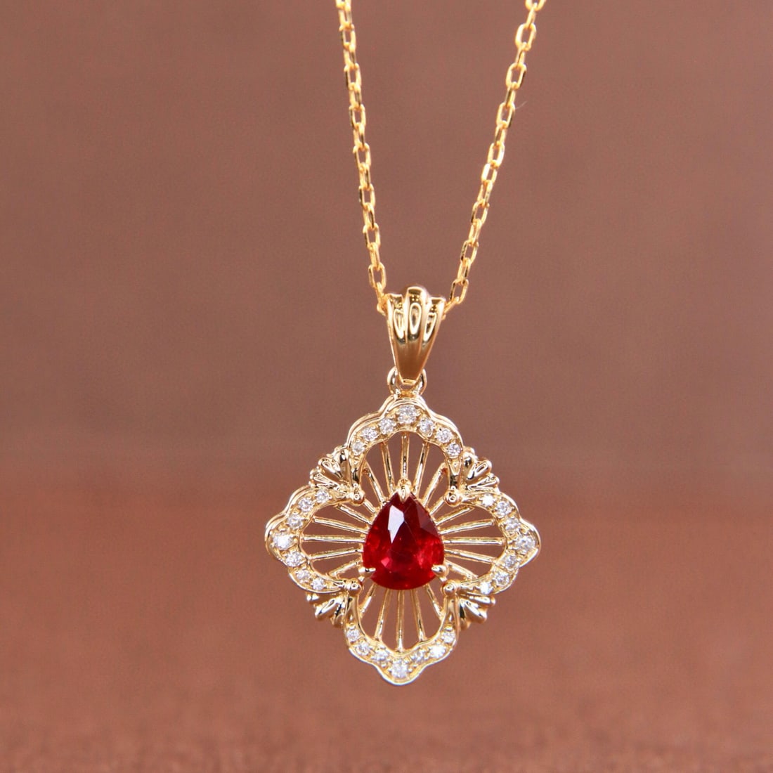 14k Gold 0.41 Ctw Natural Ruby & Diamond Necklace: Ref:231107149 // gold content:14k gold // main gemstone:ruby // shape:pear // carat weight:0. 35ct // color:pigeonblood red // treatment:natural // // adjacent gemstone 2 : diamond // shape:round //