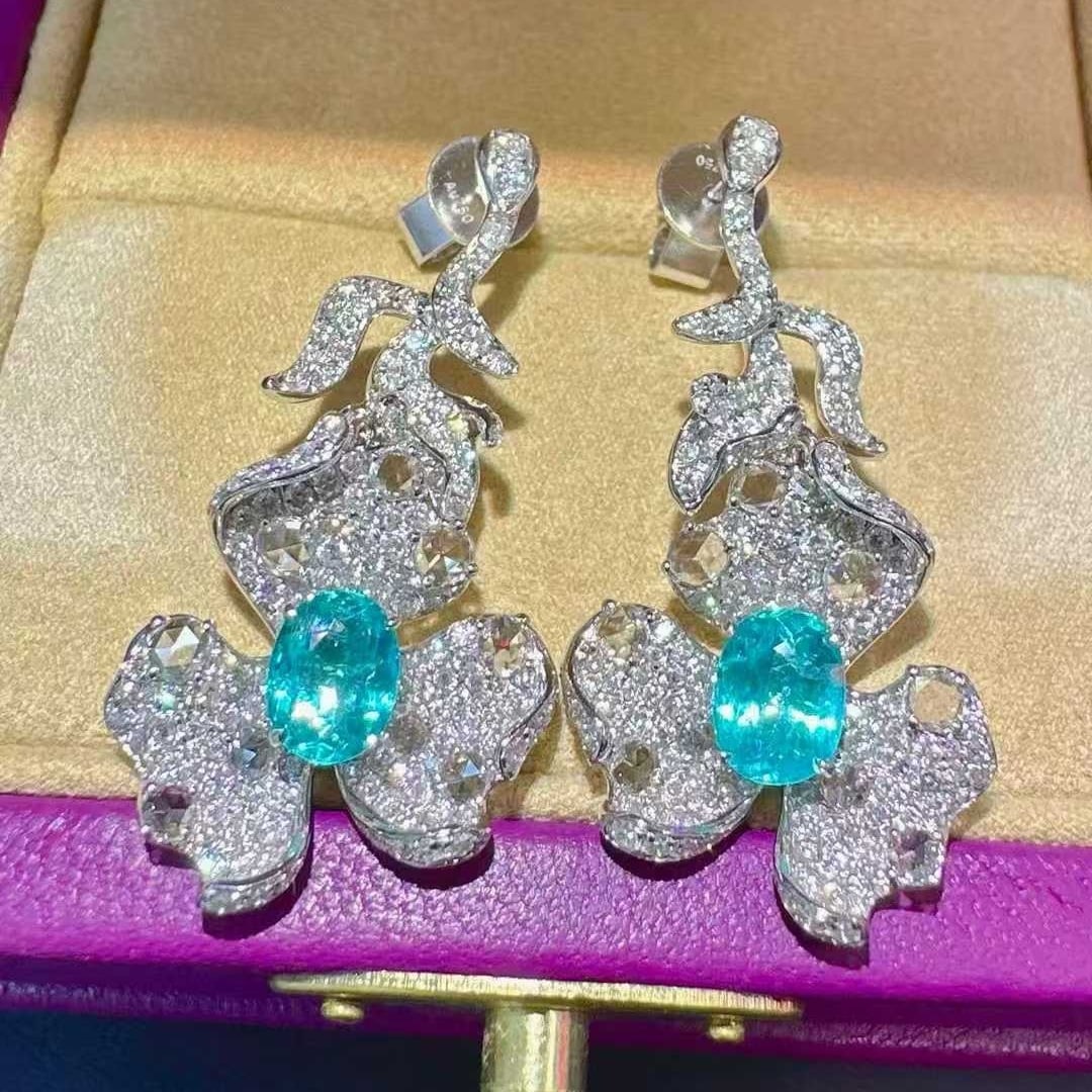 14k Gold 3.78 Ctw Natural Paraiba Tourmaline & Diamond Earrings: Ref:231107172 // gold content:14k gold // main gemstone:paraiba tourmaline // shape:oval // carat weight:1. 65ct // color:blue // treatment:natural // // adjacent gemstone 2 : diamond // shape:round