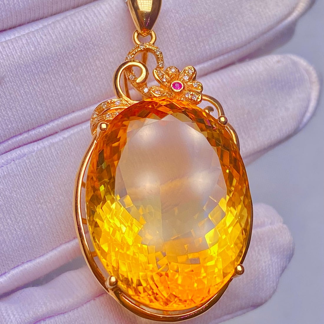 14k Gold 38.9 Ct Natural Citrine & Diamond Pendant( Without Chain ): Ref:231107180 // gold content:14k gold // main gemstone:citrine // shape:oval // carat weight:38. 9ct // color:yellow // treatment:natural // // adjacent gemstone 2 : diamond // shape:round //