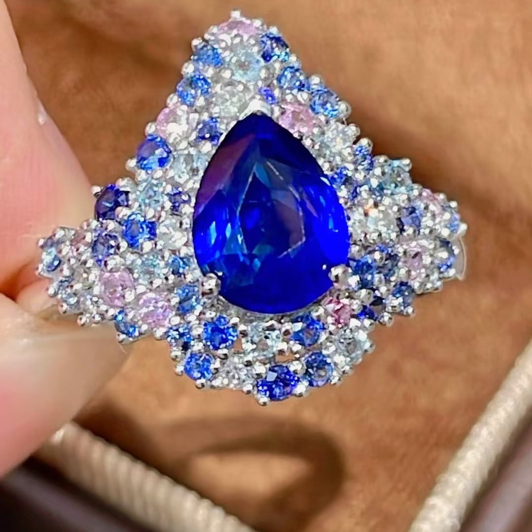 14k Gold 1.59 Ct Natural Sapphire & Diamond & Sapphire Ring: Ref:231107188 // gold content:14k gold // ring size:7. 25us // // main gemstone:sapphire // shape:pear // carat weight:1. 59ct // color:blue // treatment:natural // // adjacent gemstone 2 : diamond