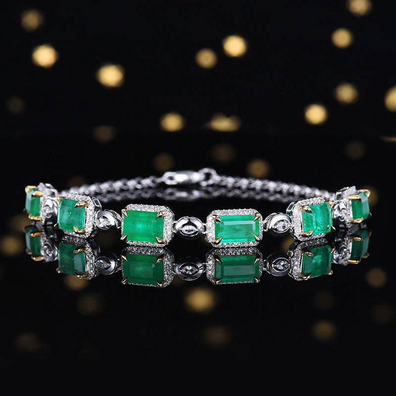 14k Gold 5.53 Ctw Natural Emerald & Diamond Bracelet: Ref:231107195 // gold content:14k gold // main gemstone:emerald // shape:octagonal // carat weight:5. 14ct // color:green // treatment:natural // // adjacent gemstone 2 : diamond // number of