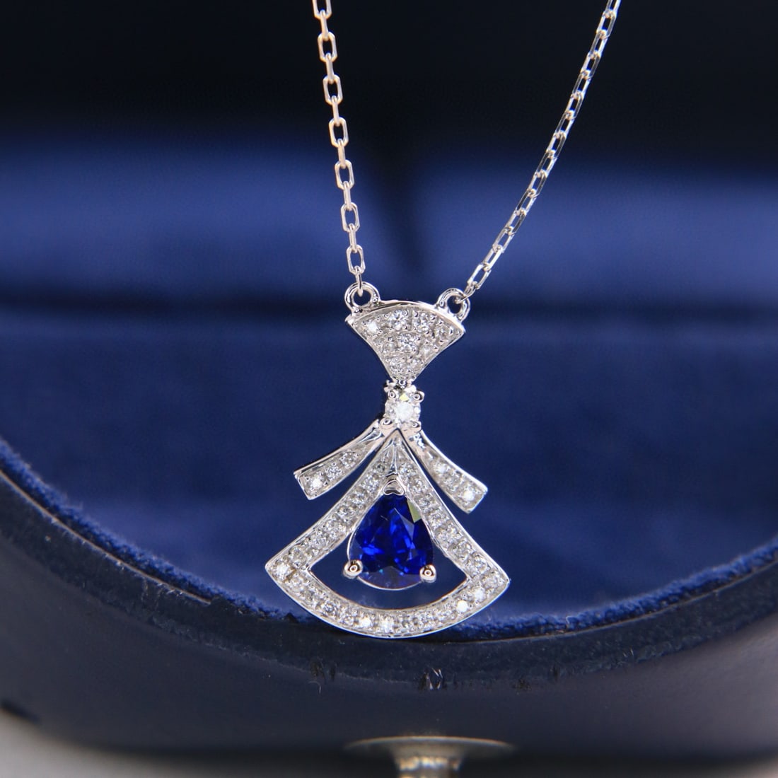 14k Gold 0.53 Ctw Vivid Blue Natural Sapphire & Diamond Necklace: Ref:231107234 // gold content:14k gold // main gemstone:sapphire // shape:pear // carat weight:0. 43ct // color:vivid blue // treatment:natural // // adjacent gemstone 2 : diamond // shape:round //