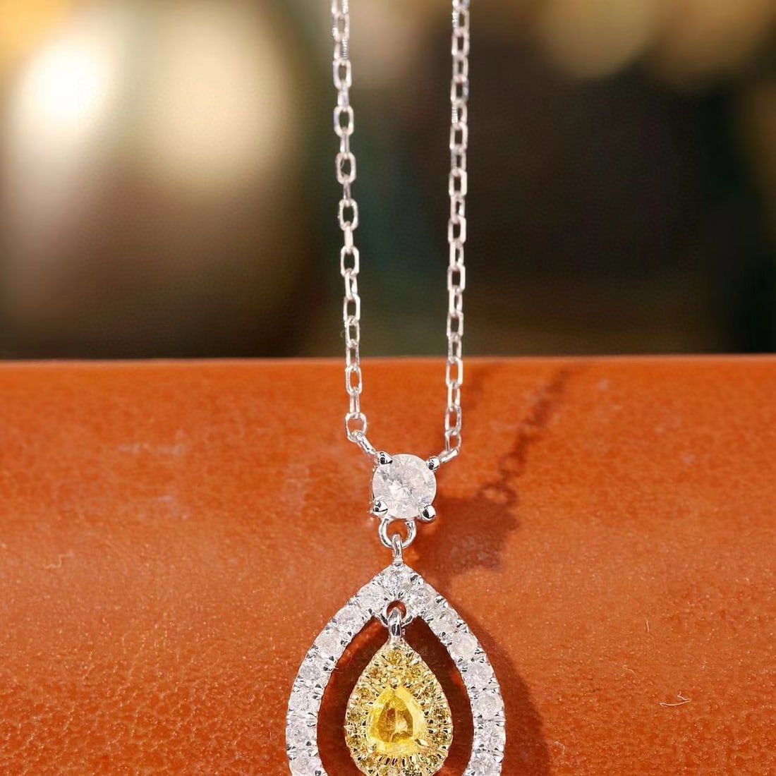 14k Gold 0.40 Ctw Natural Yellow Diamond & Diamond Necklace: Ref:231107245 // gold content:14k gold // main gemstone:yellow diamond // shape:pear // carat weight:0. 08ct // color:yellow // treatment:natural // // adjacent gemstone 2 : diamond // shape:round //