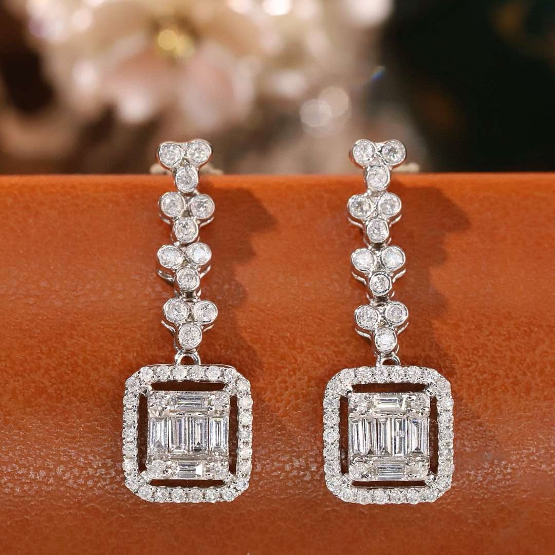 14k Gold 0.8 Ct Natural H Diamond Earrings: Ref:231107250 // gold content:14k gold // main gemstone:diamond // shape:multiple // carat weight:0. 8ct // clarity grade:vs-si // color:h // treatment:natural // High Estimate: 4300 Condition: New
