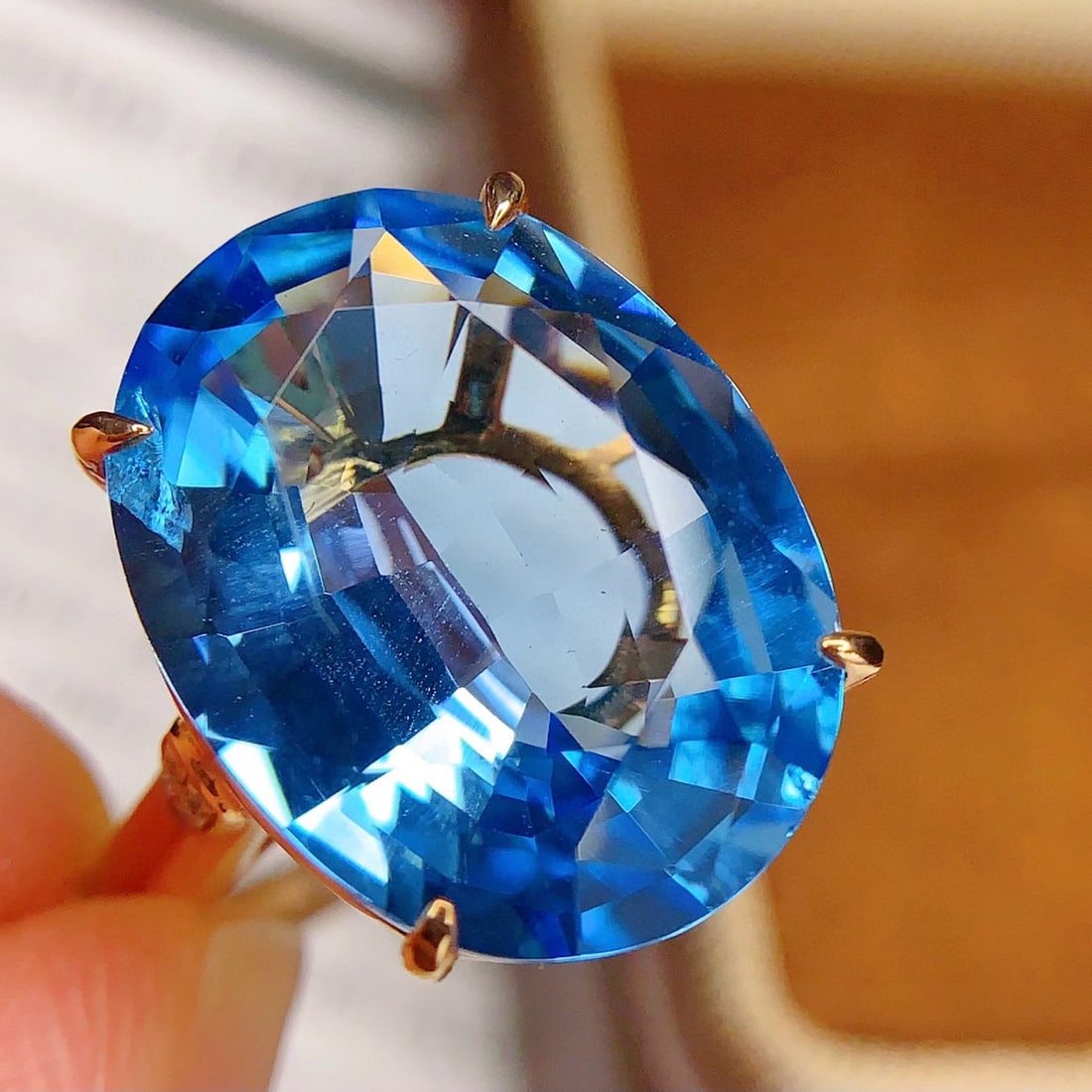 14k Gold 13 Ct Natural Topaz & Diamond Ring: Ref:231107257 // gold content:14k gold // ring size:7. 25us // // main gemstone:topaz // shape:oval // carat weight:13ct // color:blue // treatment:natural // // adjacent gemstone 2 : diamond //