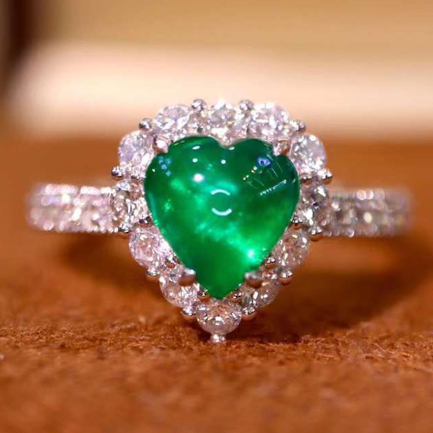 14k Gold 1.84 Ctw Vivid Green Natural Emerald & Diamond Ring: Ref:231108027 // gold content:14k gold // ring size:7. 25us // // main gemstone:emerald // shape:heart // carat weight:1. 18ct // color:vivid green // treatment:natural // // adjacent gemstone 2 :